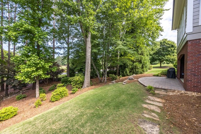 4730 Turnberry Ln Unit 15, Columbus, GA 31909 - view of grassy yard with a patio