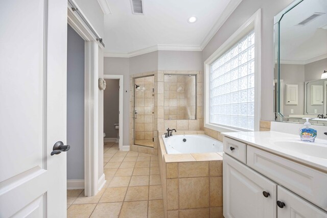 4730 Turnberry Ln Unit 15, Columbus, GA 31909 - bathroom with vanity, a bath, a shower stall, tile patterned flooring, and ornamental molding