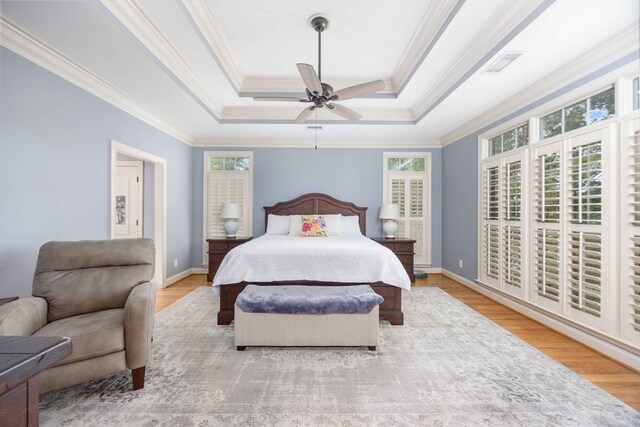 4730 Turnberry Ln Unit 15, Columbus, GA 31909 - bedroom featuring ornamental molding, wood finished floors, a raised ceiling, and ceiling fan