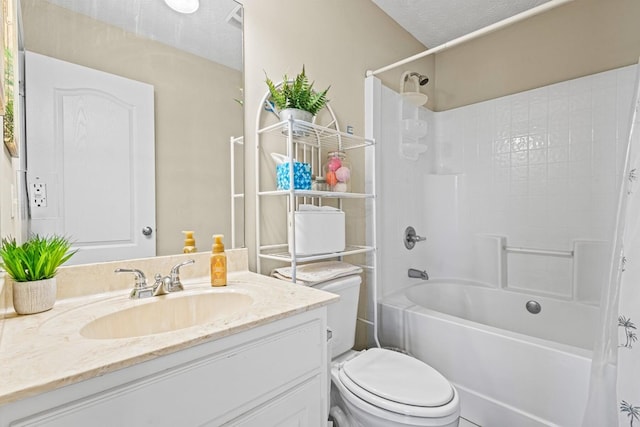 bathroom with a textured ceiling, shower / bath combination with curtain, vanity, and toilet