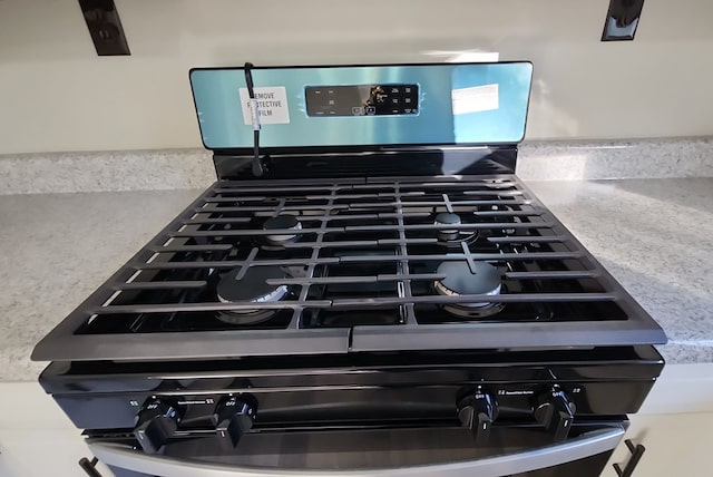 166 Pine Ridge Dr, Union Springs, AL 36089 - kitchen view of range with gas stovetop