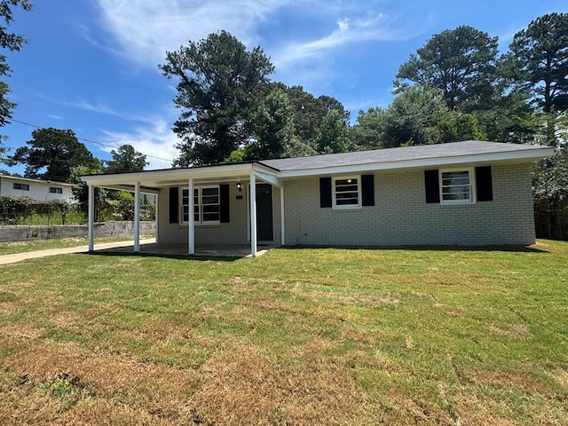 1508 Emerson Ave, Columbus, GA 31907 - single story home featuring brick siding, a front yard, and a patio area
