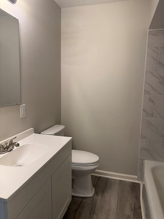 1508 Emerson Ave, Columbus, GA 31907 - full bath with a tub, vanity, wood finished floors, and a shower