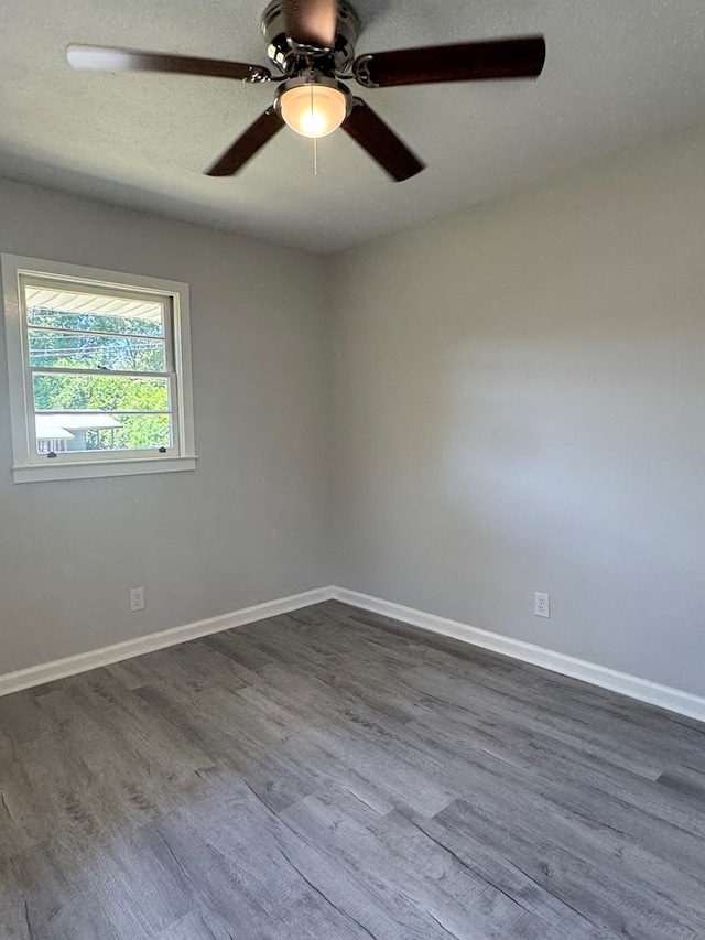 1508 Emerson Ave, Columbus, GA 31907 - spare room with dark wood-type flooring and ceiling fan