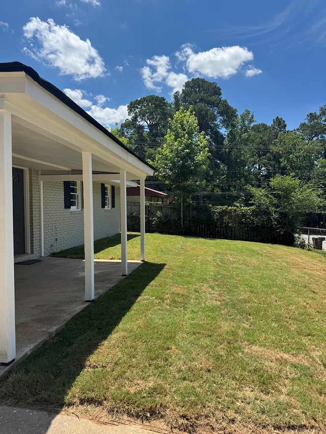 1508 Emerson Ave, Columbus, GA 31907 - view of yard with a patio and a carport