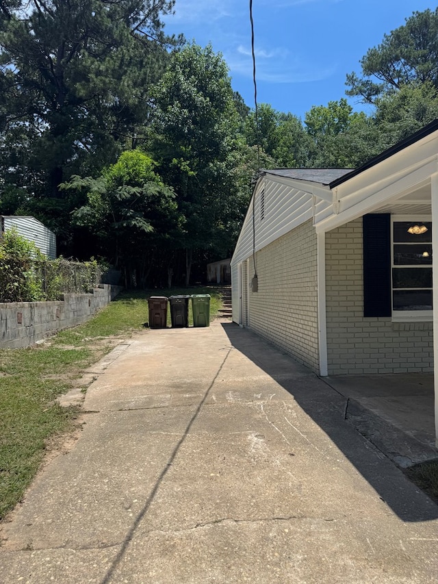 1508 Emerson Ave, Columbus, GA 31907 - view of home's exterior featuring brick siding and a patio area
