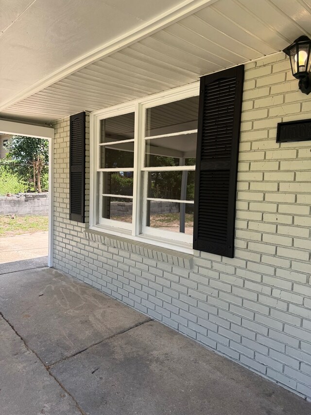 1508 Emerson Ave, Columbus, GA 31907 - view of property exterior featuring brick siding and covered porch