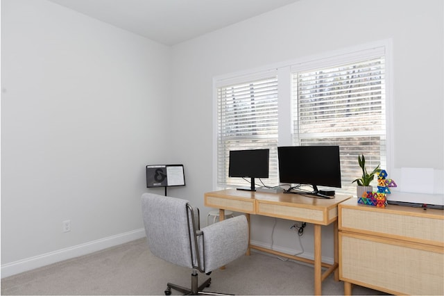 office featuring baseboards and carpet floors