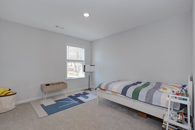 bedroom with carpet flooring, baseboards, and visible vents