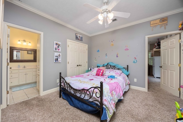 bedroom featuring light carpet, crown molding, a closet, baseboards, and connected bathroom