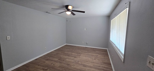 1526 Barcelona Dr, Columbus, GA 31907 - spare room featuring a wealth of natural light, a ceiling fan, and dark wood-style flooring