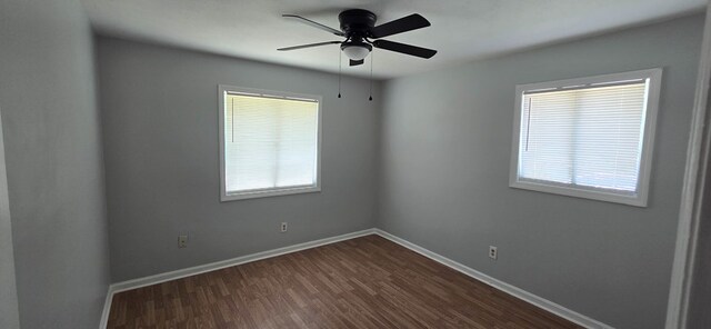 1526 Barcelona Dr, Columbus, GA 31907 - empty room with baseboards, ceiling fan, and dark wood-style flooring