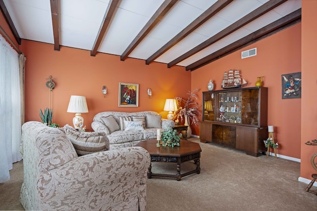 living area featuring visible vents, carpet floors, baseboards, and vaulted ceiling with beams