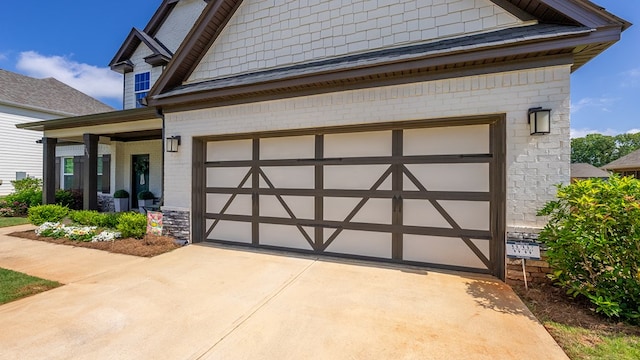 2013 Hereford Ln, Columbus, GA 31904 - view of front of home with concrete driveway, stone siding, and brick siding