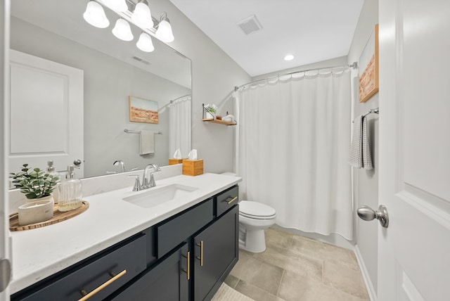 2013 Hereford Ln, Columbus, GA 31904 - bathroom featuring vanity, toilet, stone finish floors, and recessed lighting