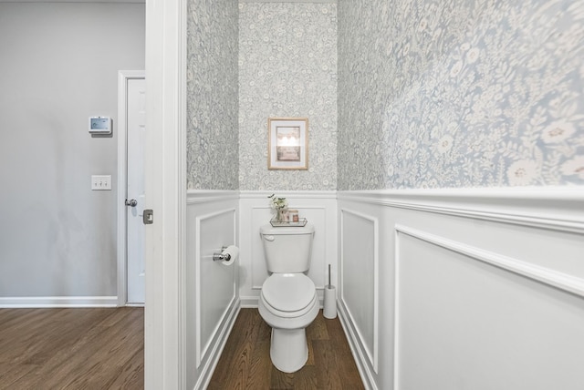 2013 Hereford Ln, Columbus, GA 31904 - bathroom featuring wainscoting, wood finished floors, and a decorative wall