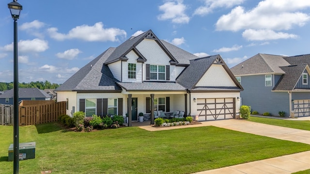 2013 Hereford Ln, Columbus, GA 31904 - view of front facade with a porch, a garage, concrete driveway, roof with shingles, and brick siding