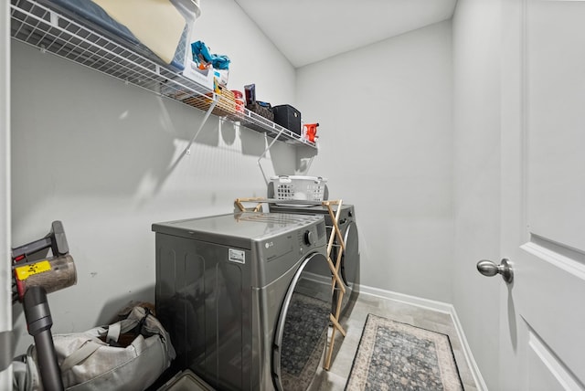 2013 Hereford Ln, Columbus, GA 31904 - washroom with washing machine and clothes dryer and baseboards