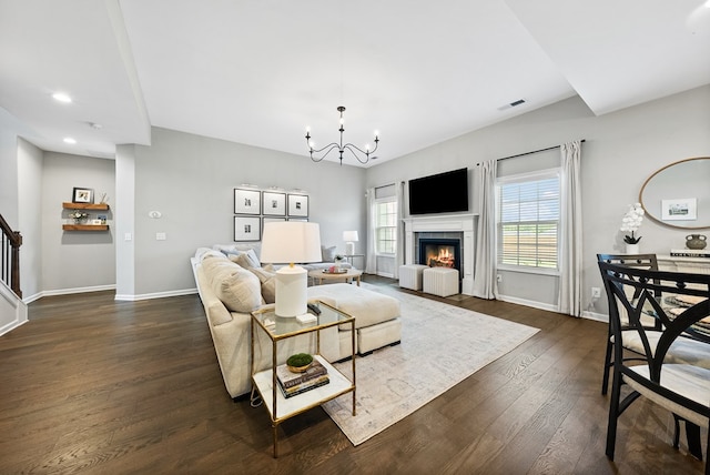 2013 Hereford Ln, Columbus, GA 31904 - living area featuring a chandelier, dark wood-style floors, stairs, a fireplace, and recessed lighting