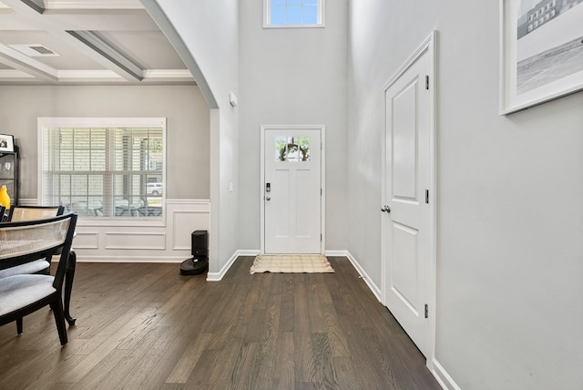 2013 Hereford Ln, Columbus, GA 31904 - foyer entrance with arched walkways, dark wood finished floors, beam ceiling, coffered ceiling, and a towering ceiling