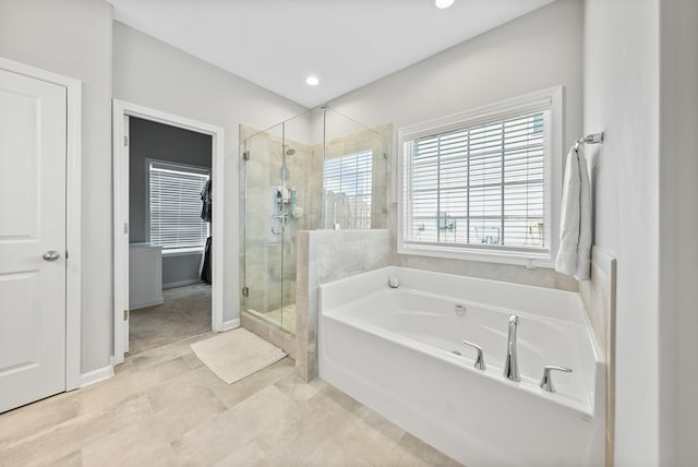 2013 Hereford Ln, Columbus, GA 31904 - full bathroom with a shower stall, a bath, baseboards, and recessed lighting