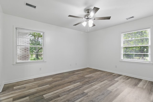 5202 Lakeshore Rd, Columbus, GA 31907 - spare room featuring plenty of natural light, wood finished floors, a ceiling fan, and baseboards