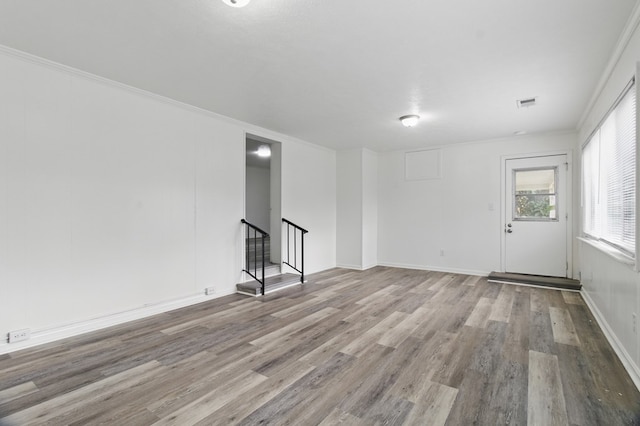 5202 Lakeshore Rd, Columbus, GA 31907 - empty room with wood finished floors, stairs, baseboards, and ornamental molding