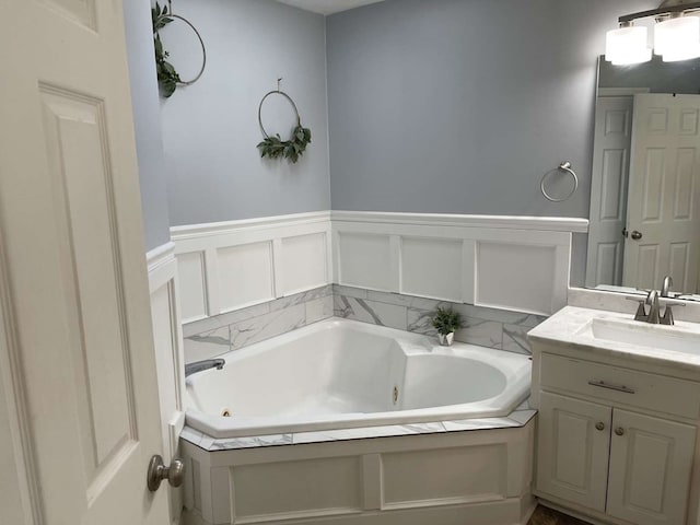 bathroom featuring vanity and a bathtub