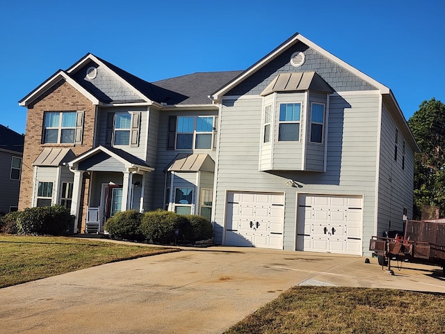 view of front of home featuring a garage and concrete driveway