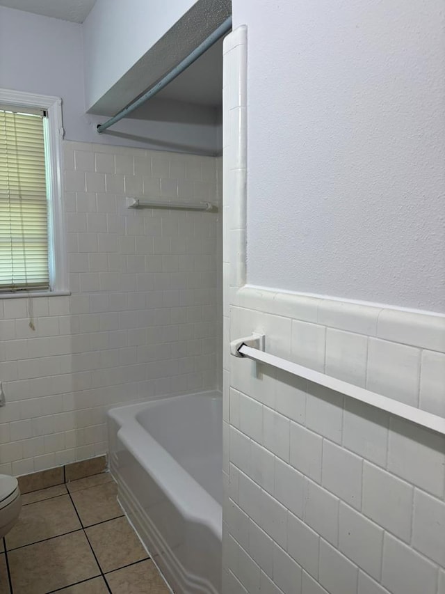 1403 Forest Dr, Columbus, GA 31907 - bathroom featuring tile walls, tile patterned flooring, and wainscoting