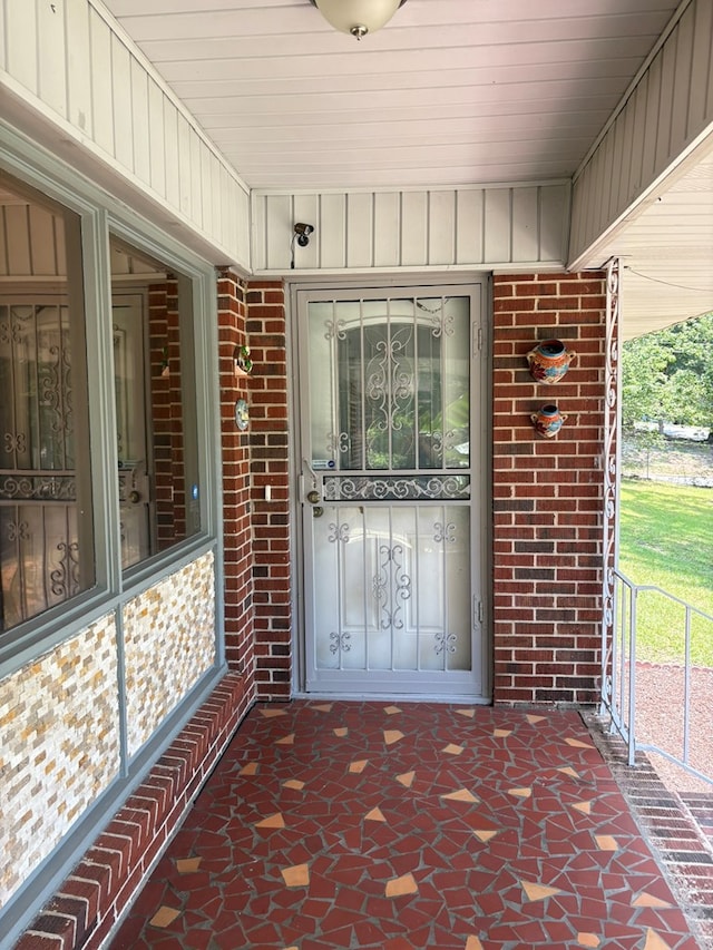 1403 Forest Dr, Columbus, GA 31907 - doorway to property with brick siding and covered porch
