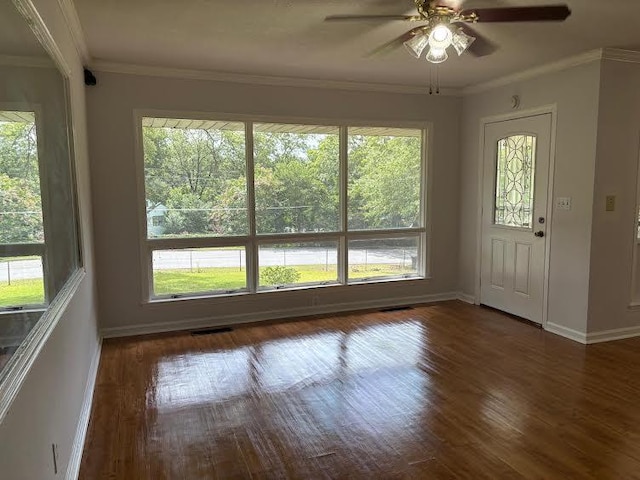 1403 Forest Dr, Columbus, GA 31907 - foyer featuring healthy amount of natural light, wood finished floors, a ceiling fan, and crown molding