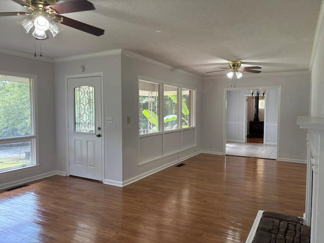 1403 Forest Dr, Columbus, GA 31907 - entrance foyer with ceiling fan, healthy amount of natural light, wood finished floors, and a textured ceiling