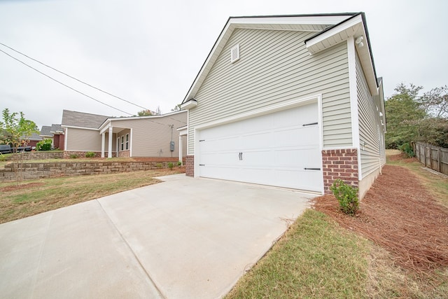 view of side of property with a yard