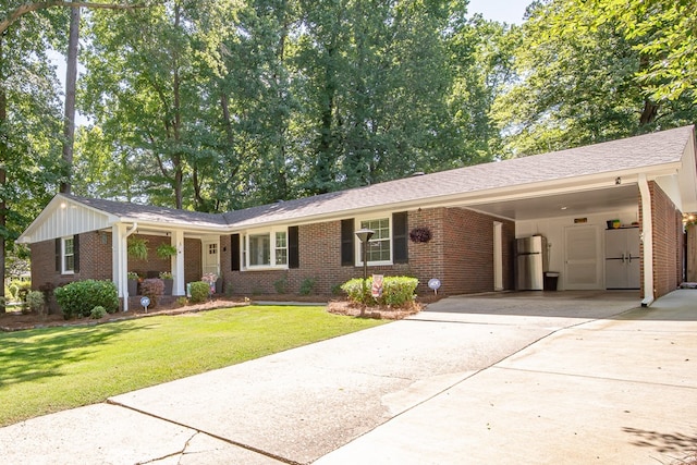 3422 Malatche Dr, Columbus, GA 31907 - single story home featuring concrete driveway, brick siding, and a carport