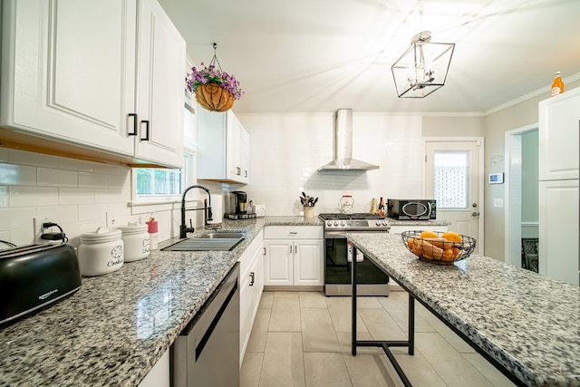 3422 Malatche Dr, Columbus, GA 31907 - kitchen with appliances with stainless steel finishes, wall chimney range hood, tasteful backsplash, white cabinetry, and light stone counters