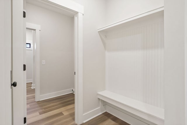 mudroom with wood-type flooring