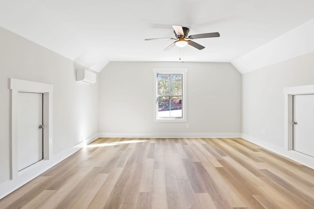 additional living space featuring ceiling fan, light hardwood / wood-style flooring, and lofted ceiling