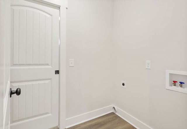 washroom with hardwood / wood-style floors, hookup for an electric dryer, and washer hookup