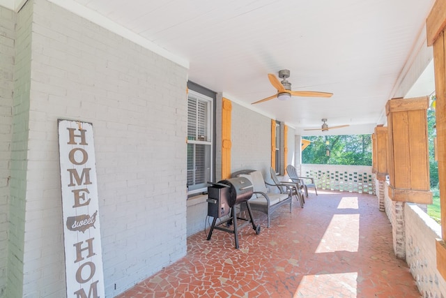 view of patio featuring a porch