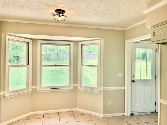 7396 Cedar Creek Loop, Columbus, GA 31904 - doorway featuring light tile patterned floors, plenty of natural light, a textured ceiling, baseboards, and ornamental molding
