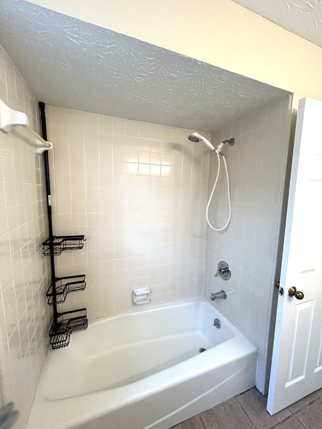 7396 Cedar Creek Loop, Columbus, GA 31904 - full bath featuring washtub / shower combination, a textured ceiling, and wood finished floors