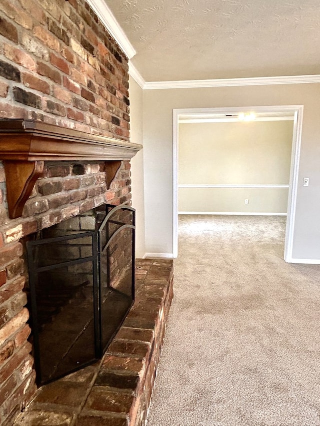 interior space featuring a textured ceiling, a fireplace, baseboards, and crown molding