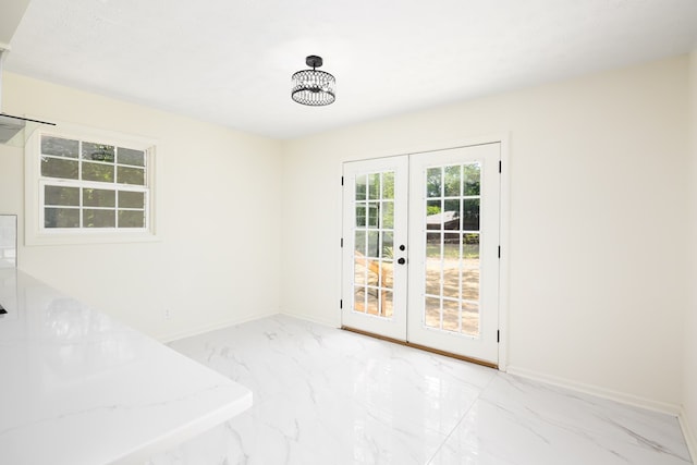 754 Wright Dr, Columbus, GA 31907 - unfurnished dining area featuring french doors and marble finish flooring