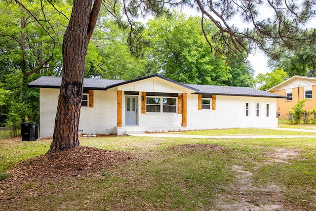 754 Wright Dr, Columbus, GA 31907 - view of front of property featuring brick siding, a front lawn, and roof with shingles