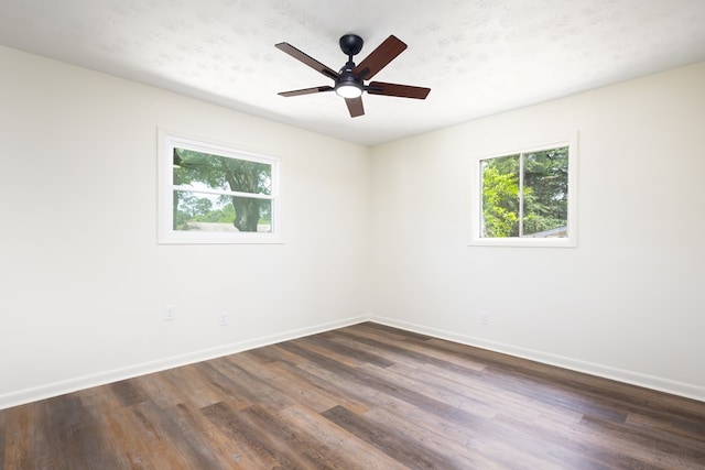 754 Wright Dr, Columbus, GA 31907 - spare room with dark wood-style floors and a ceiling fan