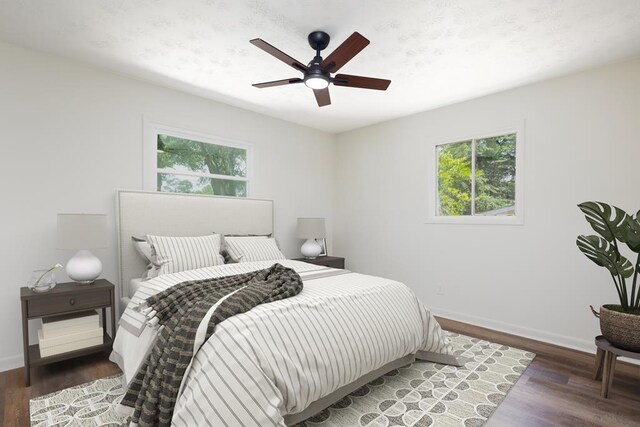 754 Wright Dr, Columbus, GA 31907 - bedroom with multiple windows, wood finished floors, and ceiling fan