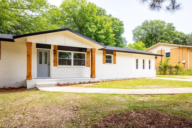 754 Wright Dr, Columbus, GA 31907 - view of front of home with brick siding and a front lawn