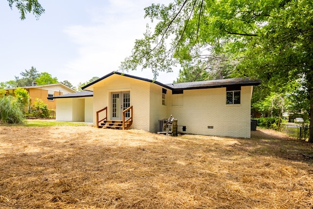 754 Wright Dr, Columbus, GA 31907 - back of property featuring french doors, brick siding, crawl space, and entry steps