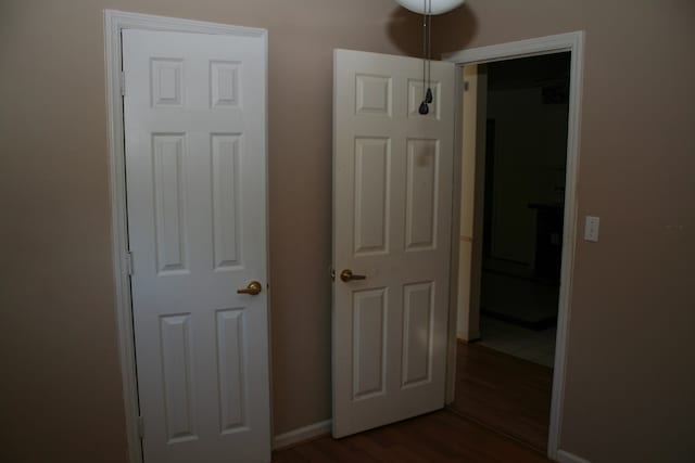 bedroom with wood-type flooring